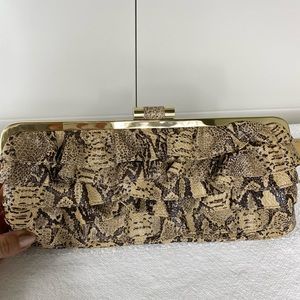 Bebe python embossed leather clutch with frill detail